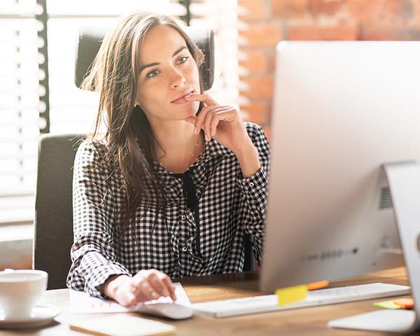 Person completing eLearning on a computer